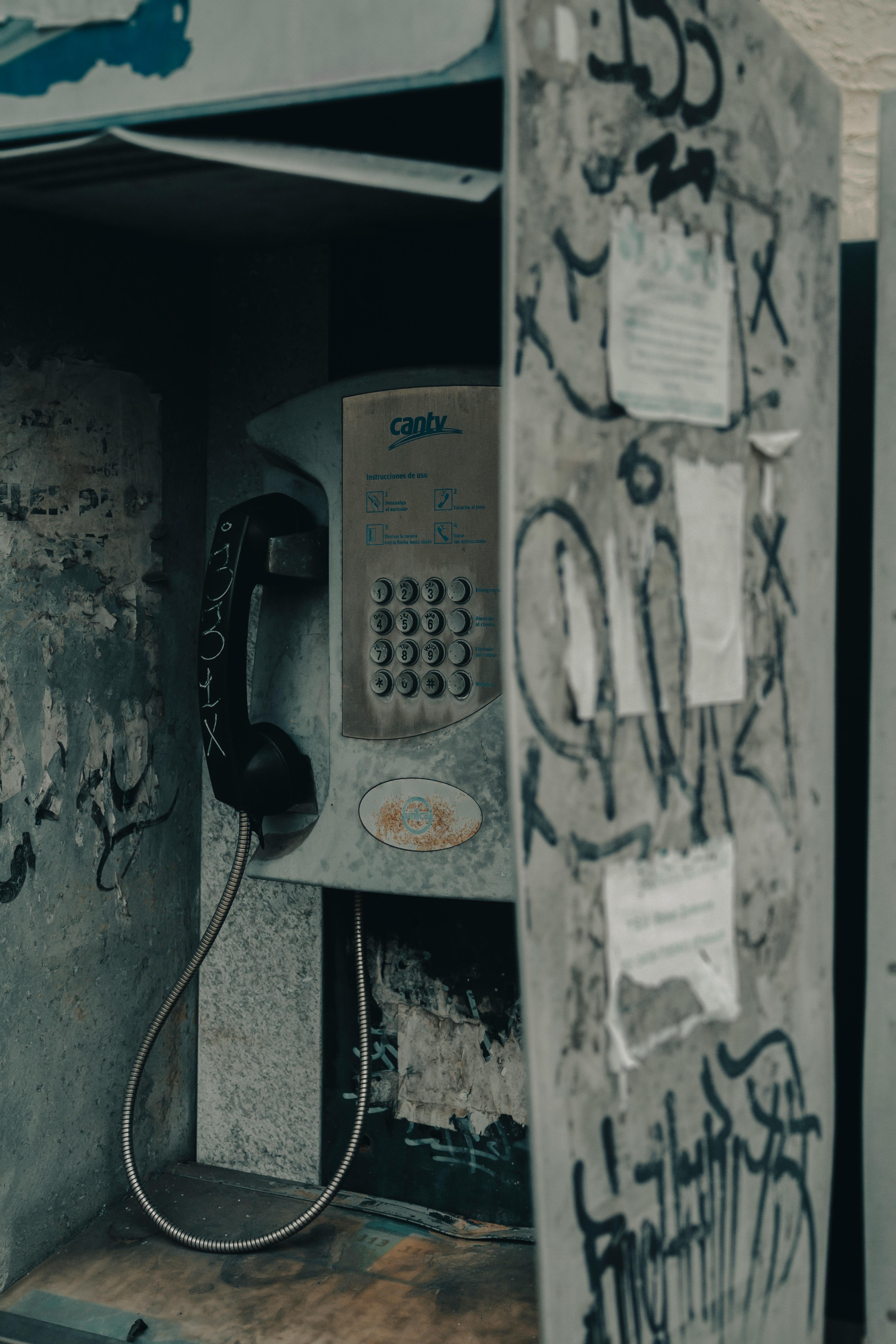 4000x6000 A pay phone with graffiti on it · Free