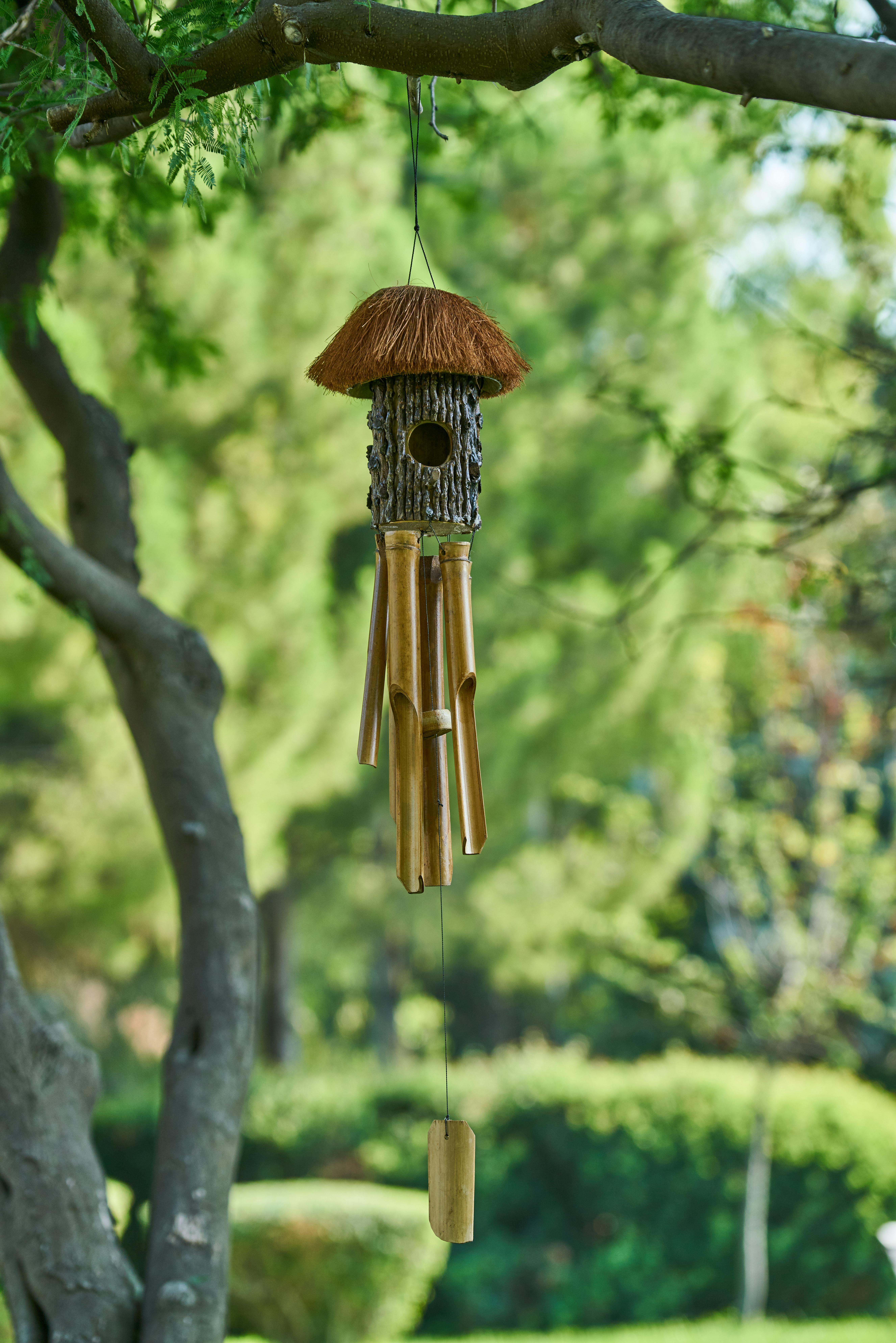 5304x7952 A Hanging Wind Chime on a Wood · Free