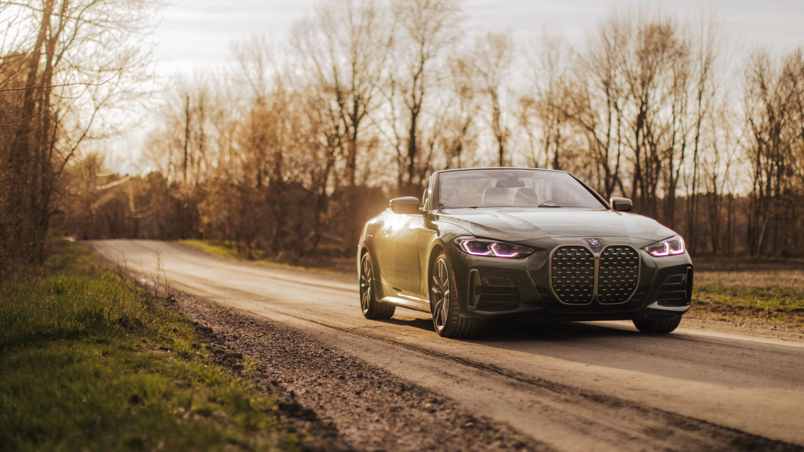 2560x1440 Exploring In The Modern BMW Convertible