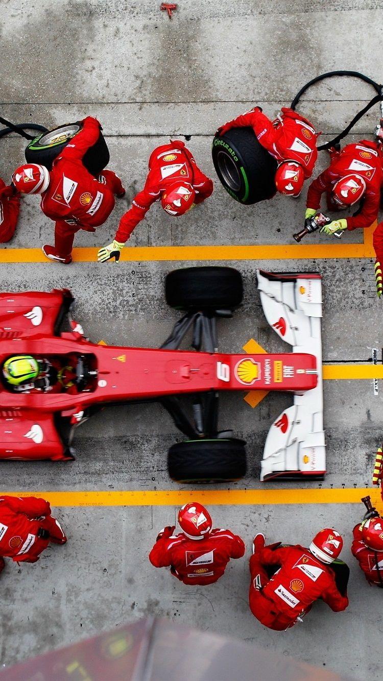 750x1334 F1 Formula One racing, emergency tire change 750x1334 iPhone
