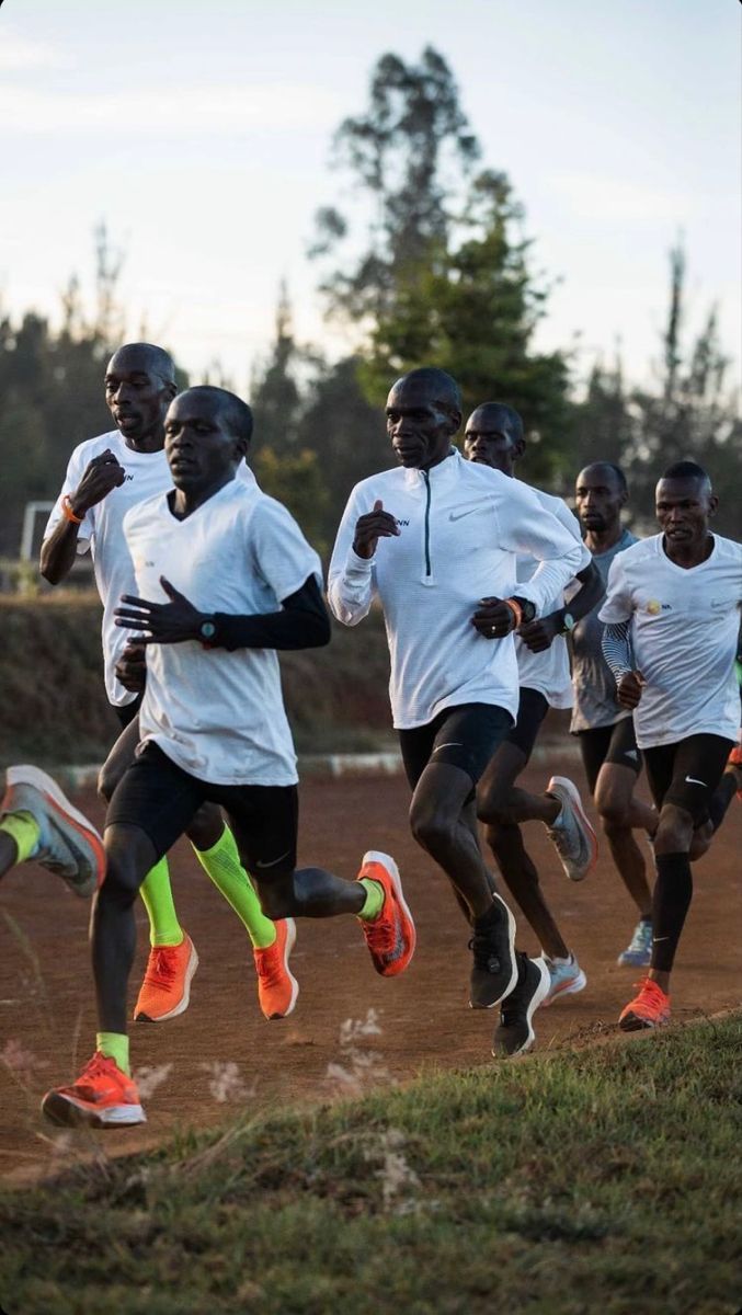 677x1200 Eliud Kipchoge training group