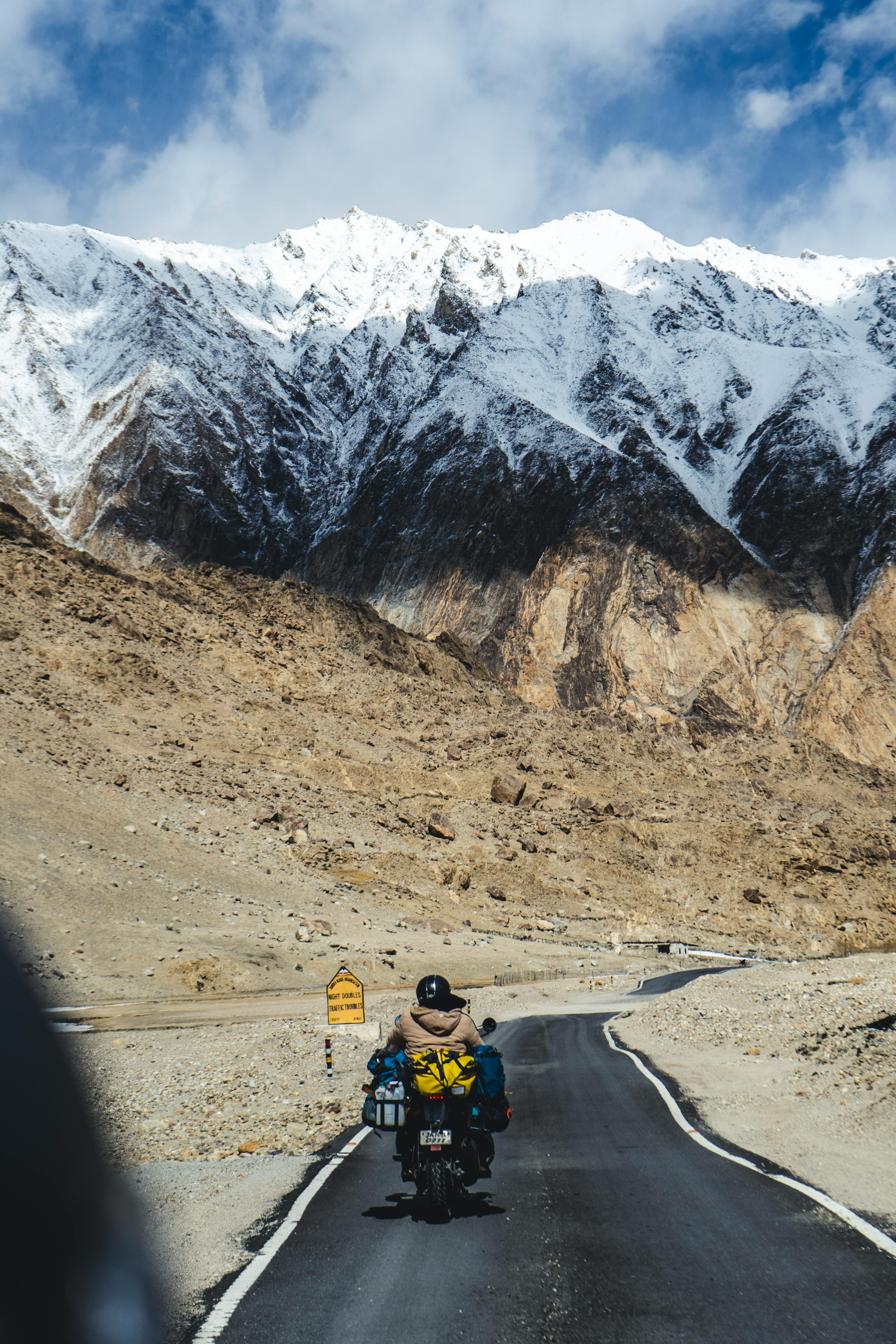 3533x5299 Man by Motorcycle on Road through