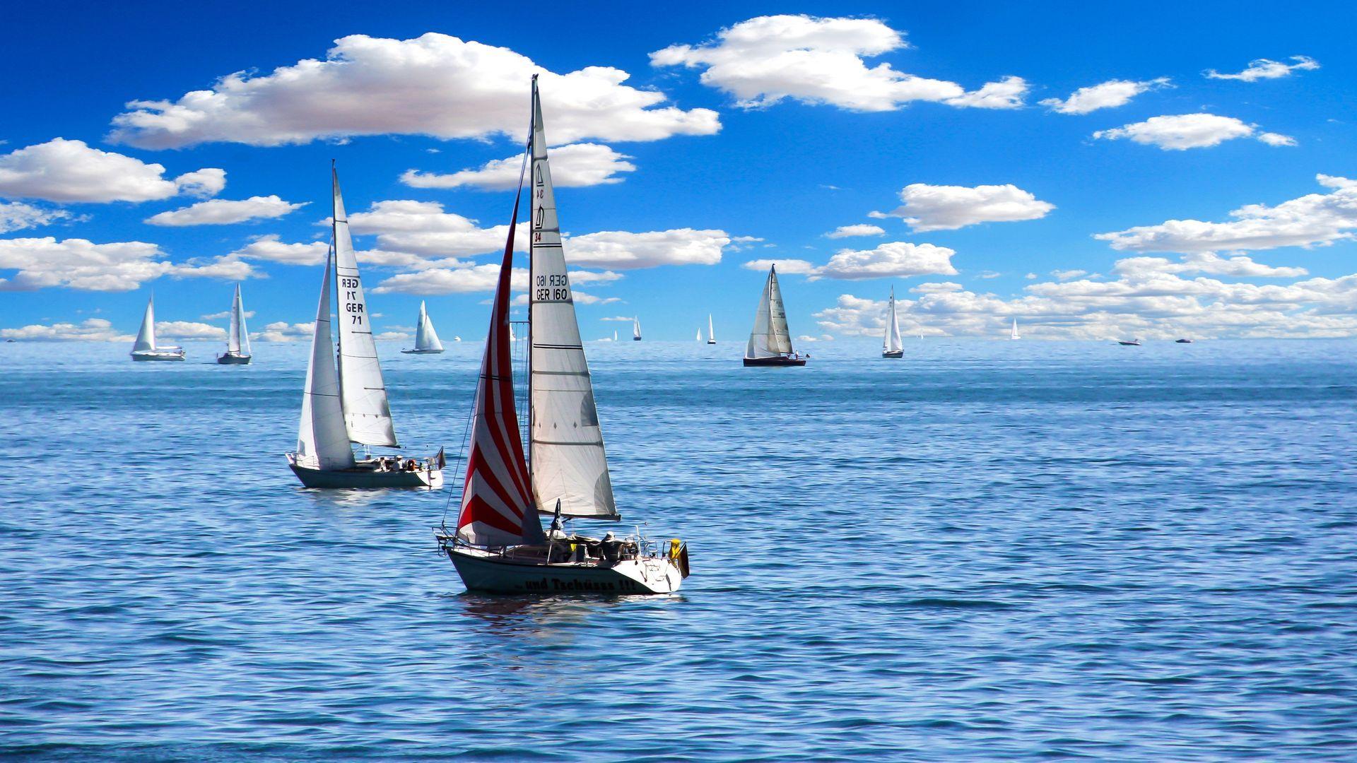 1920x1080 Blue Sea Sailing Boat Wallpaper