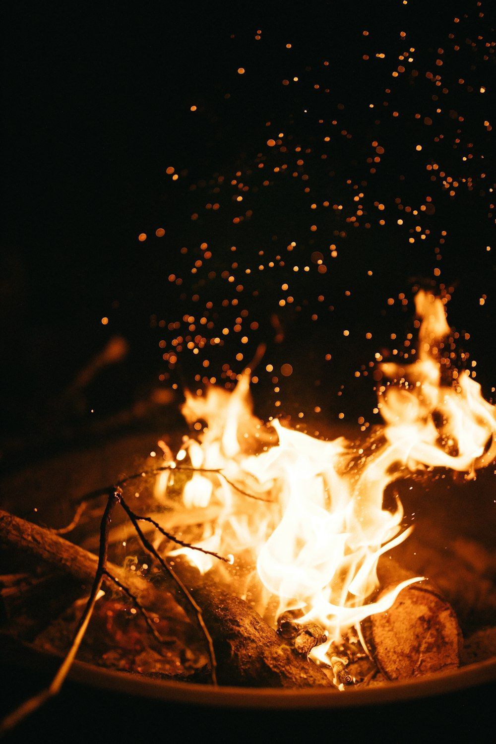 1000x1500 A fire burning in a pot photo