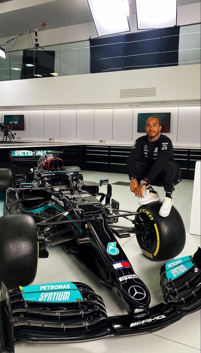 686x1200 Lewis Hamilton F1 Car 2021 Wallpaper