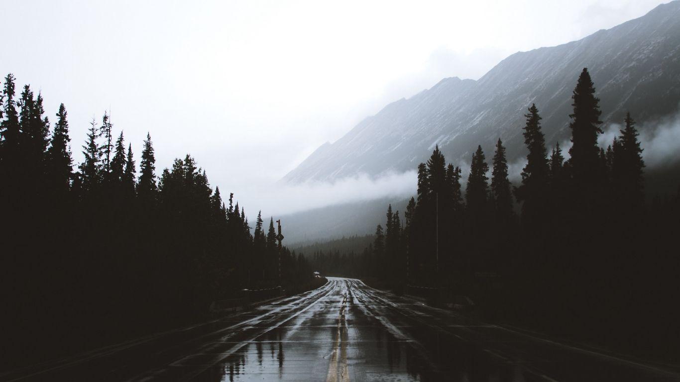 1366x768 Download wallpaper 1366x768 road, fog, marking, mountains