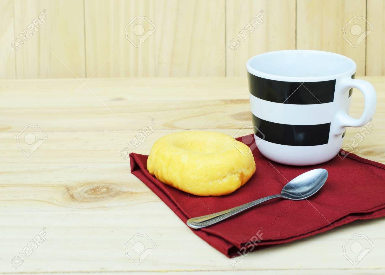 1300x928 Fresh Donut With A Coffee Cup On Wooden Table