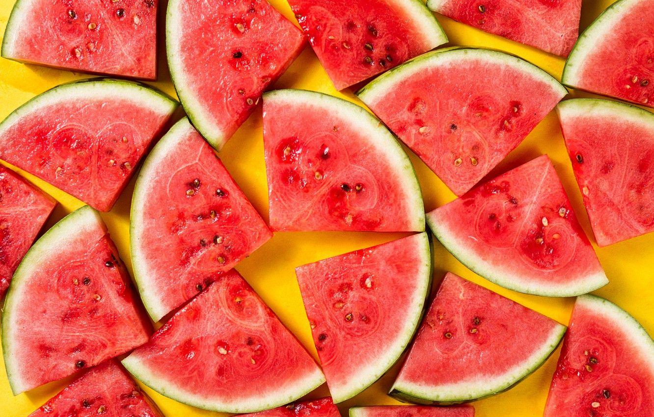 1332x850 Wallpaper watermelon, yellow background, slices, yellow