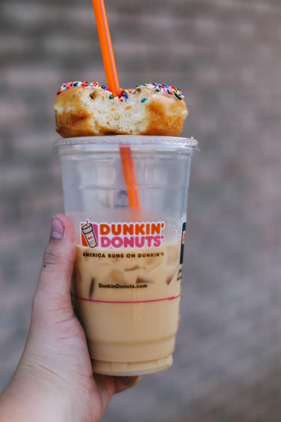 970x1455 dunkin' donuts' on top of iced coffee cup and orange straw