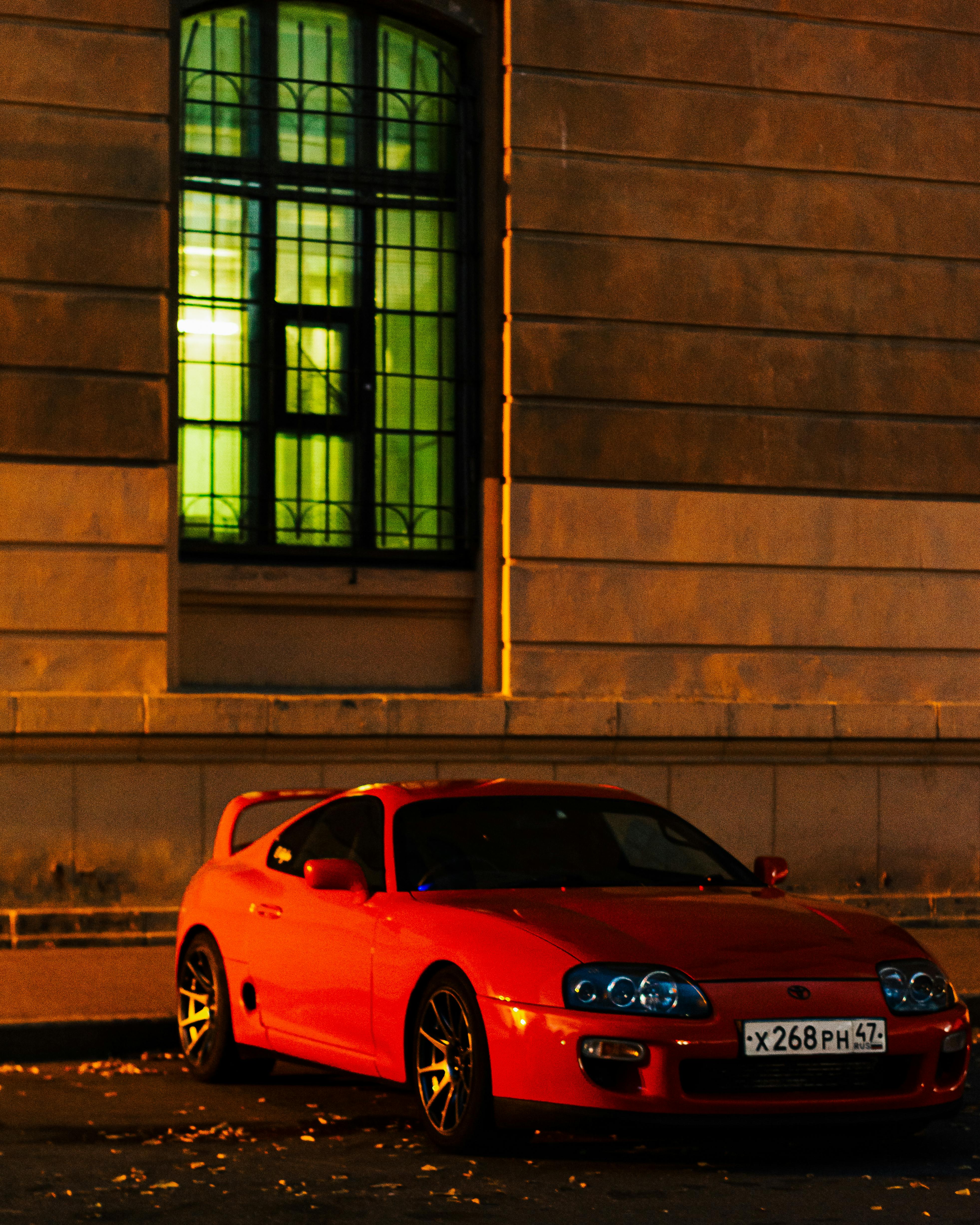 3926x4908 A Red Toyota Supra Parked on