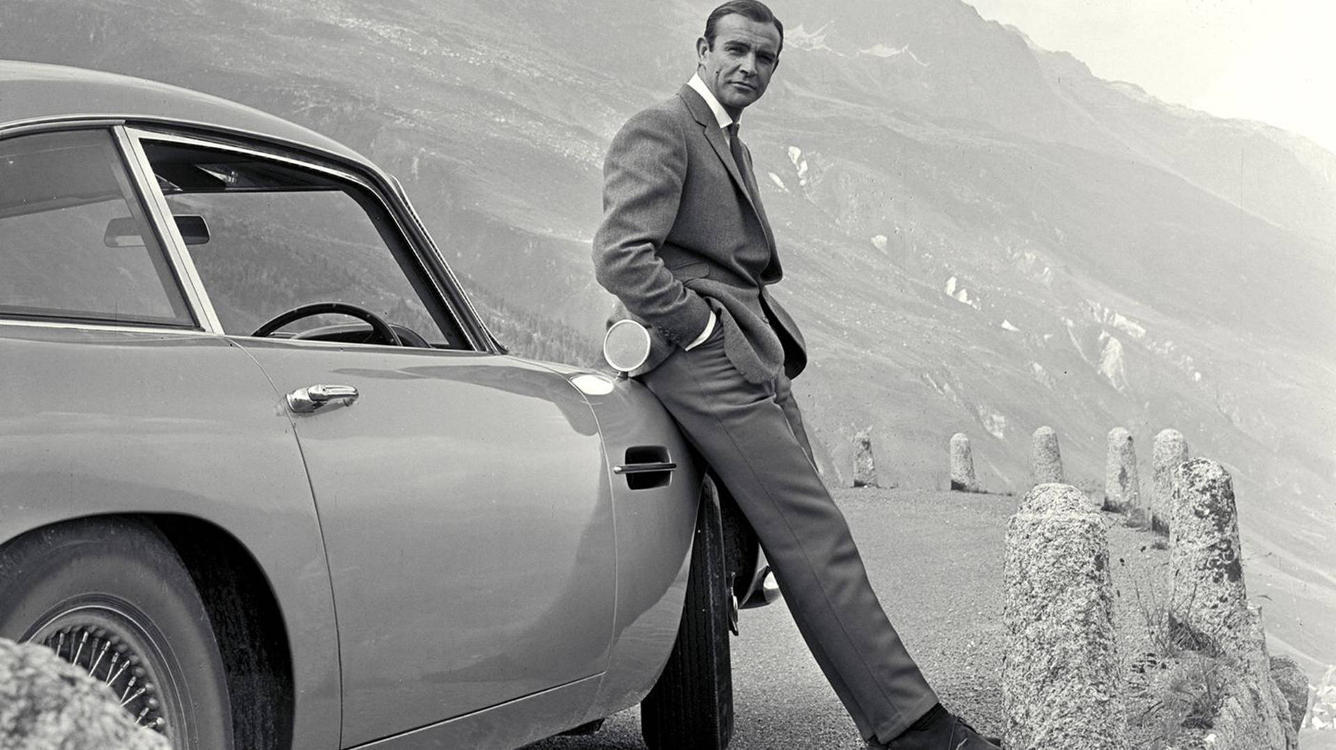 1920x1078 Sean Connery Aston Martin Car Wallpaper