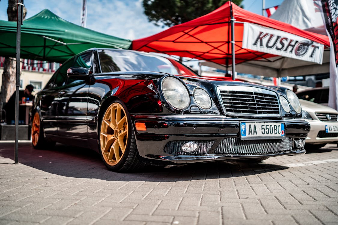 1125x750 Black Mercedes W210 at a Car Show