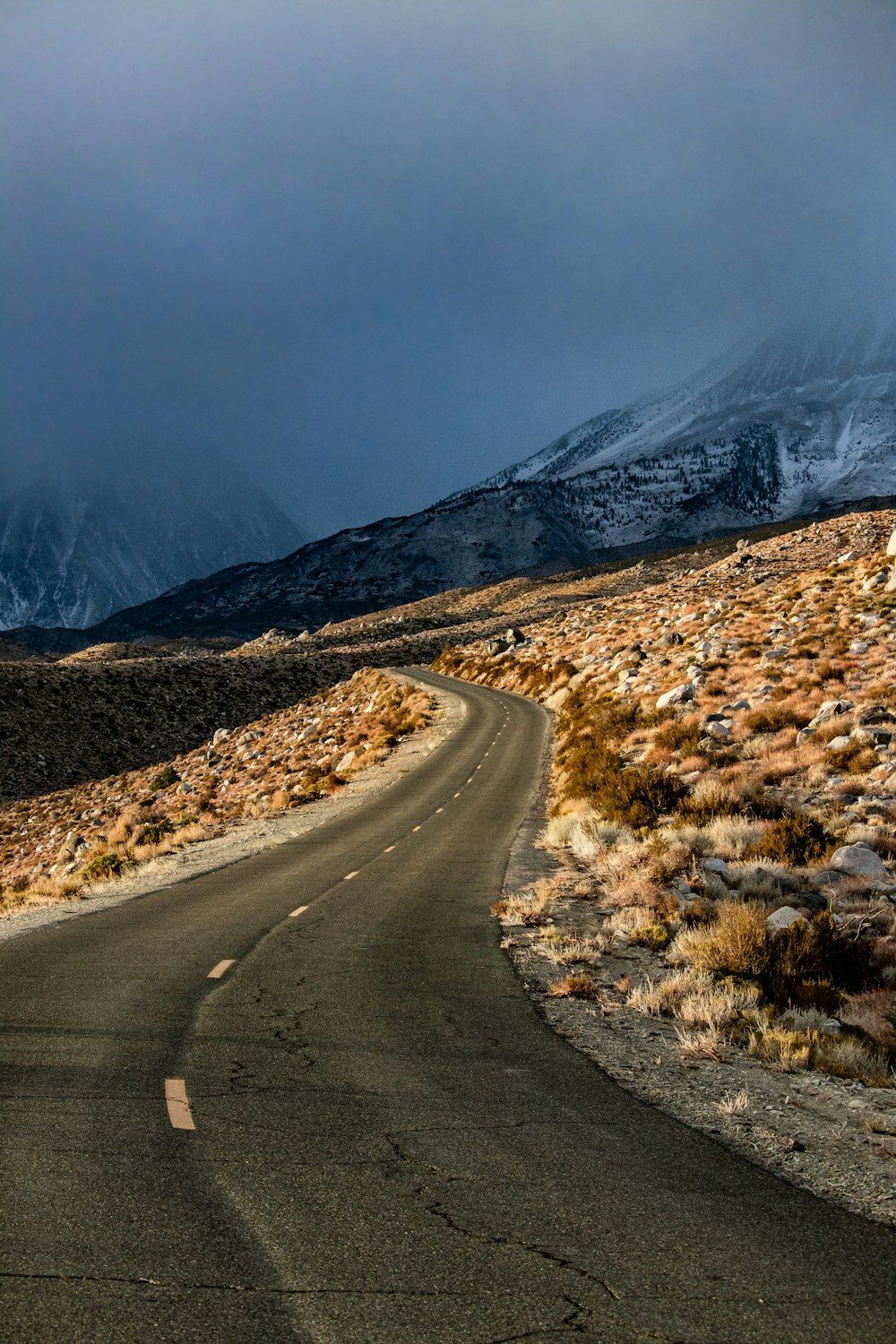 1000x1500 A road with snow on the side photo