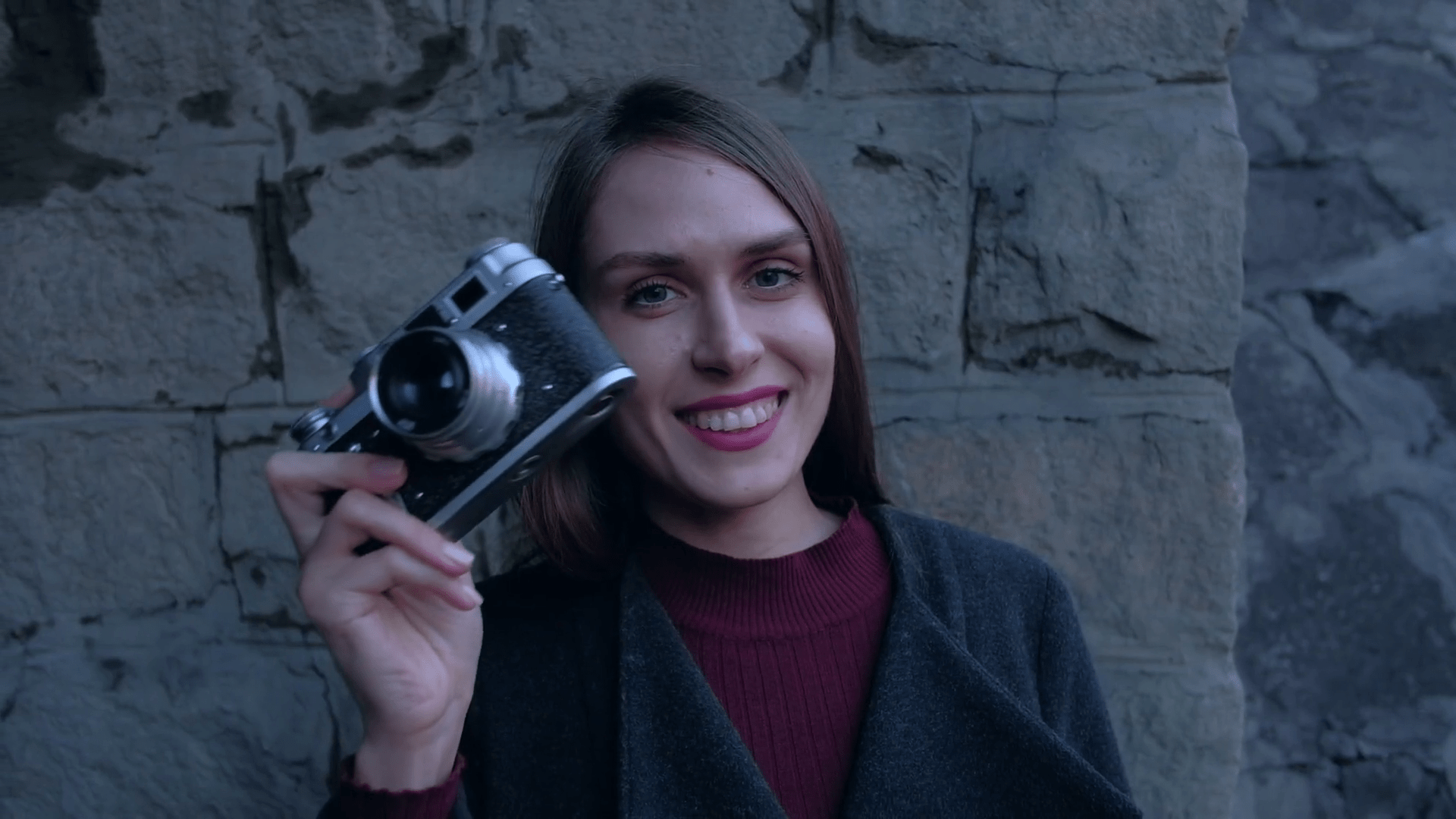 1920x1080 Slowmotion. Outdoor fashion sensual portrait of pretty young beautiful brunette woman hipster photographer tourist taking picture in old city evening