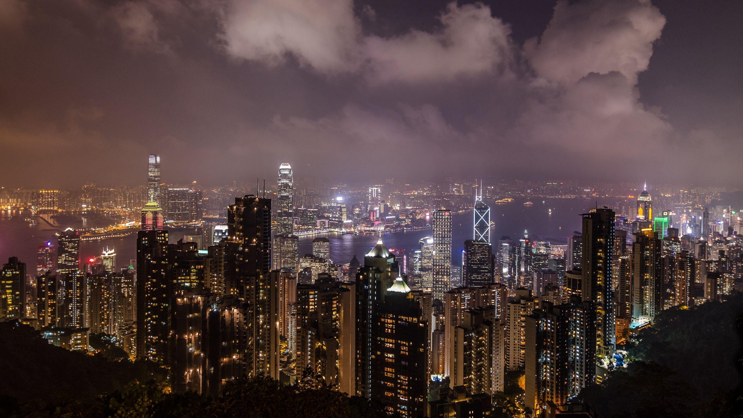 2560x1440 Download wallpaper 2560x1440 night city, skyscrapers