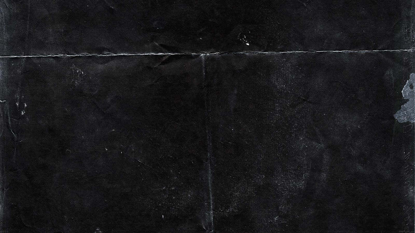 1600x900 Black Tiled Wall With A Black Splatter