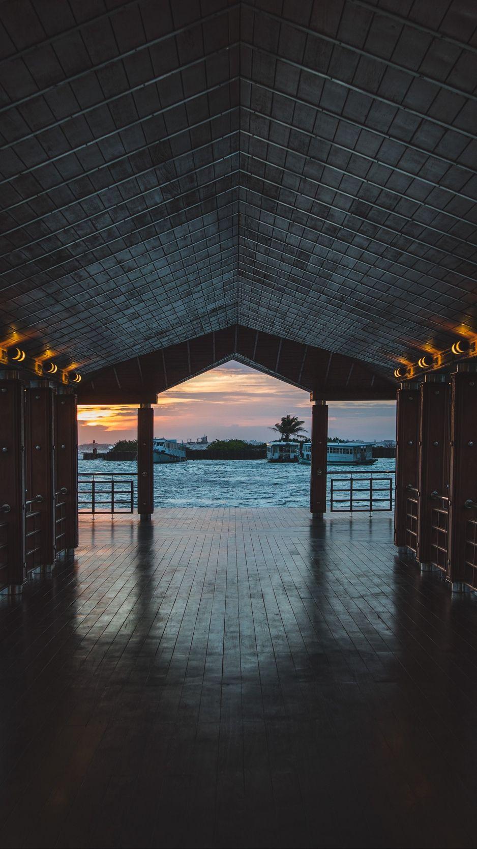 938x1668 Download wallpaper 938x1668 pier, boardwalk, ocean, palm