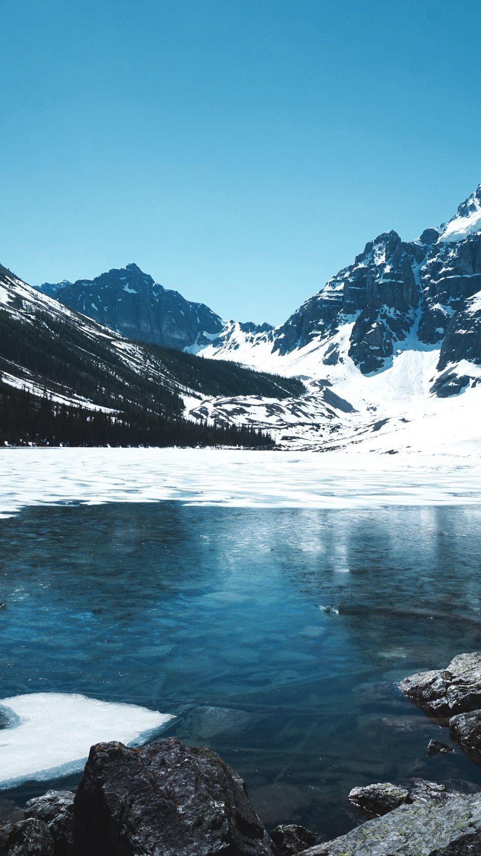 938x1668 Download wallpaper 938x1668 mountains, lake, ice, snow