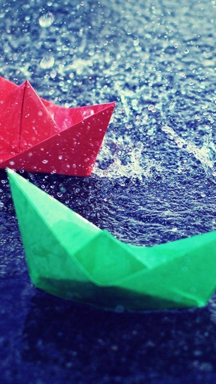 750x1334 Colorful Boats In Rain IPhone Wallpaper
