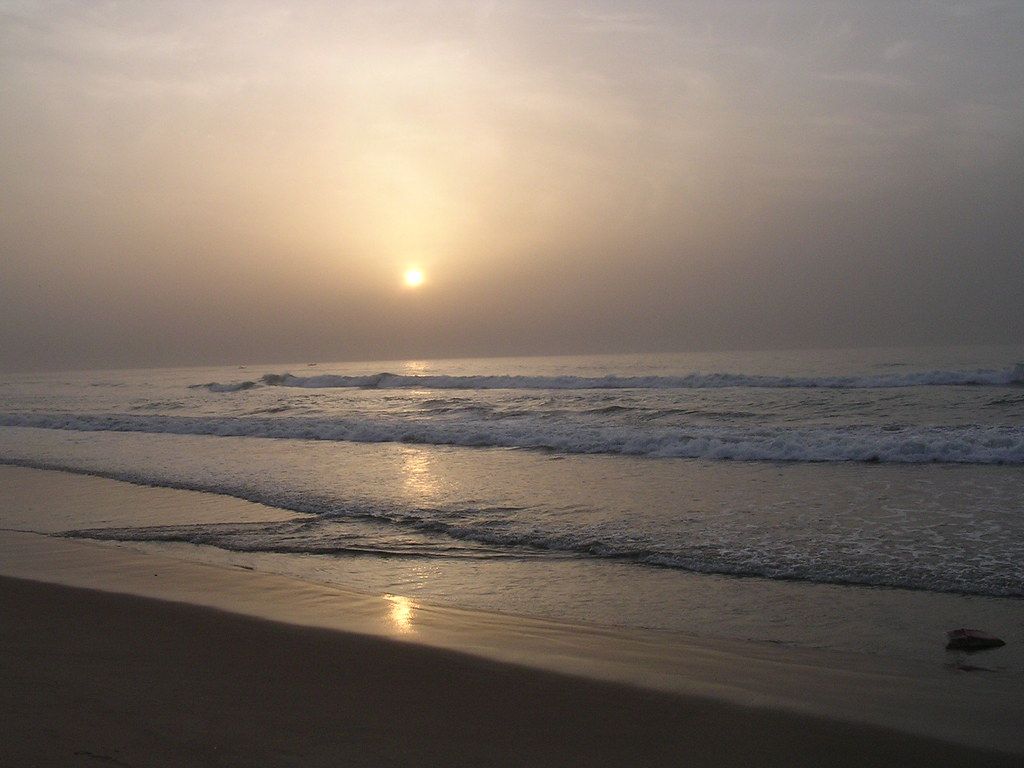 1024x768 Sunrise at marina beach. Here the tsu