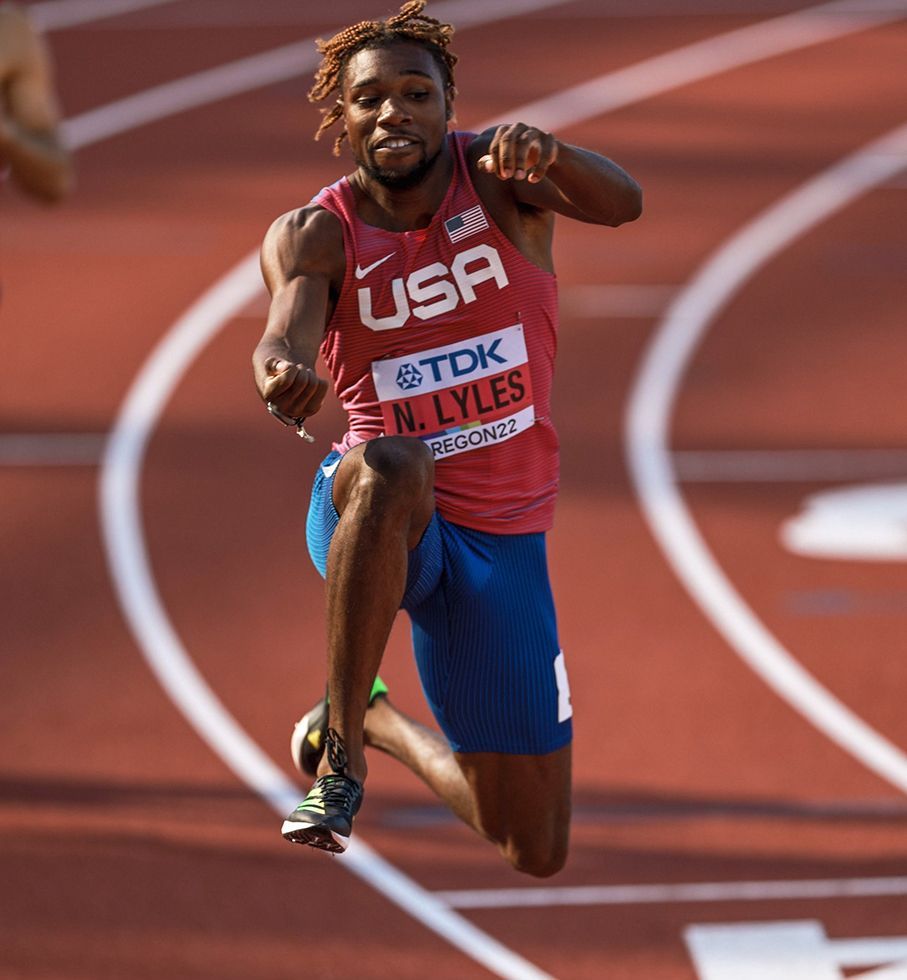 907x980 Lyles puts 200m field on notice