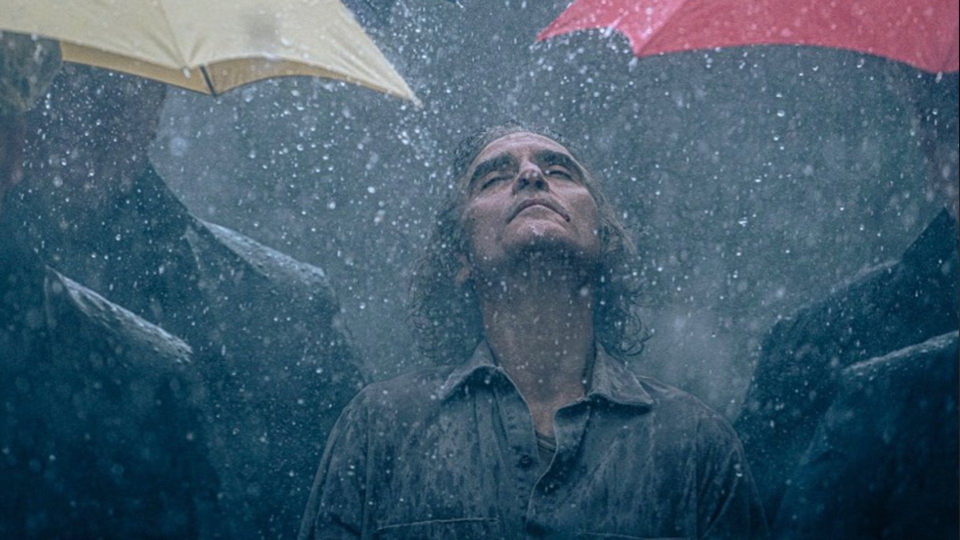 1920x1080 Joaquin Phoenix Enjoying The Rain