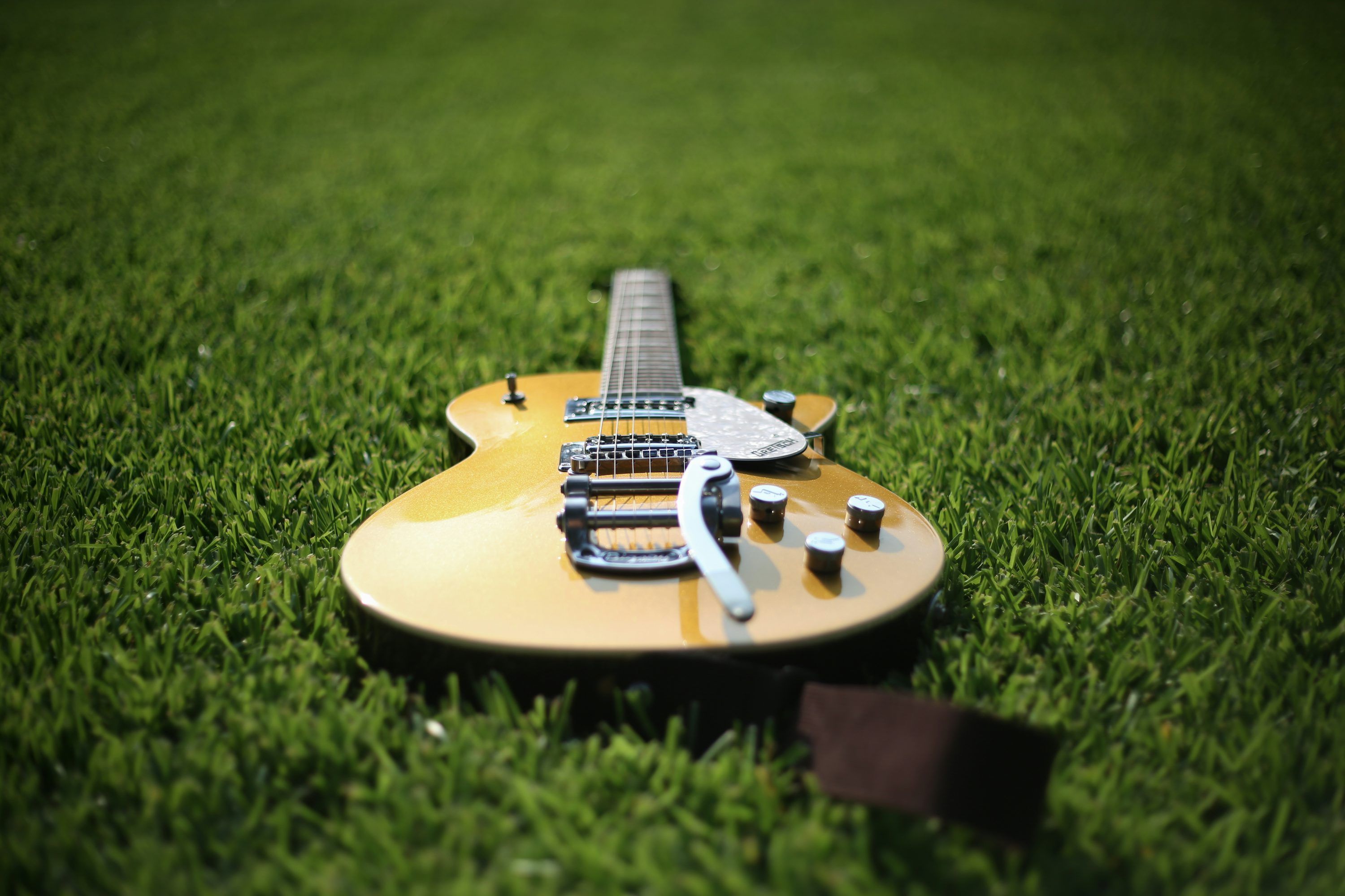3000x2000 Jazz acoustic guitar on lawn photo