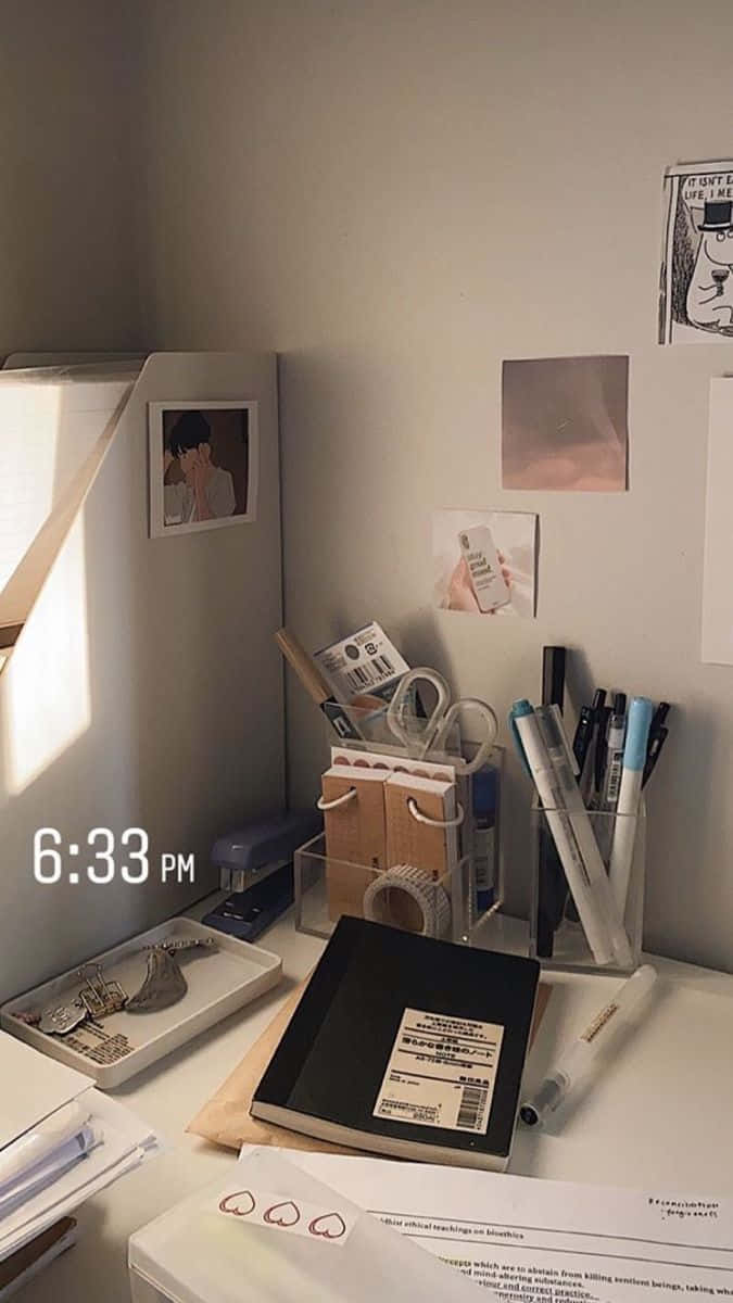 675x1200 Desk With A Lot Of Papers And A Clock
