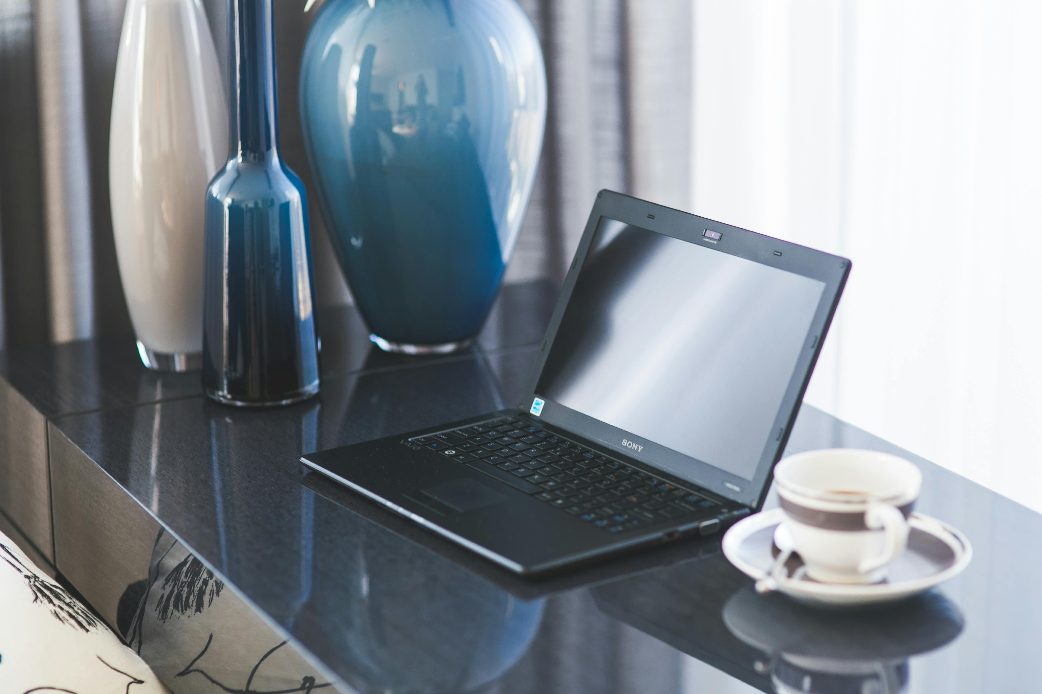 4104x2736 Home office desk with laptop and coffee