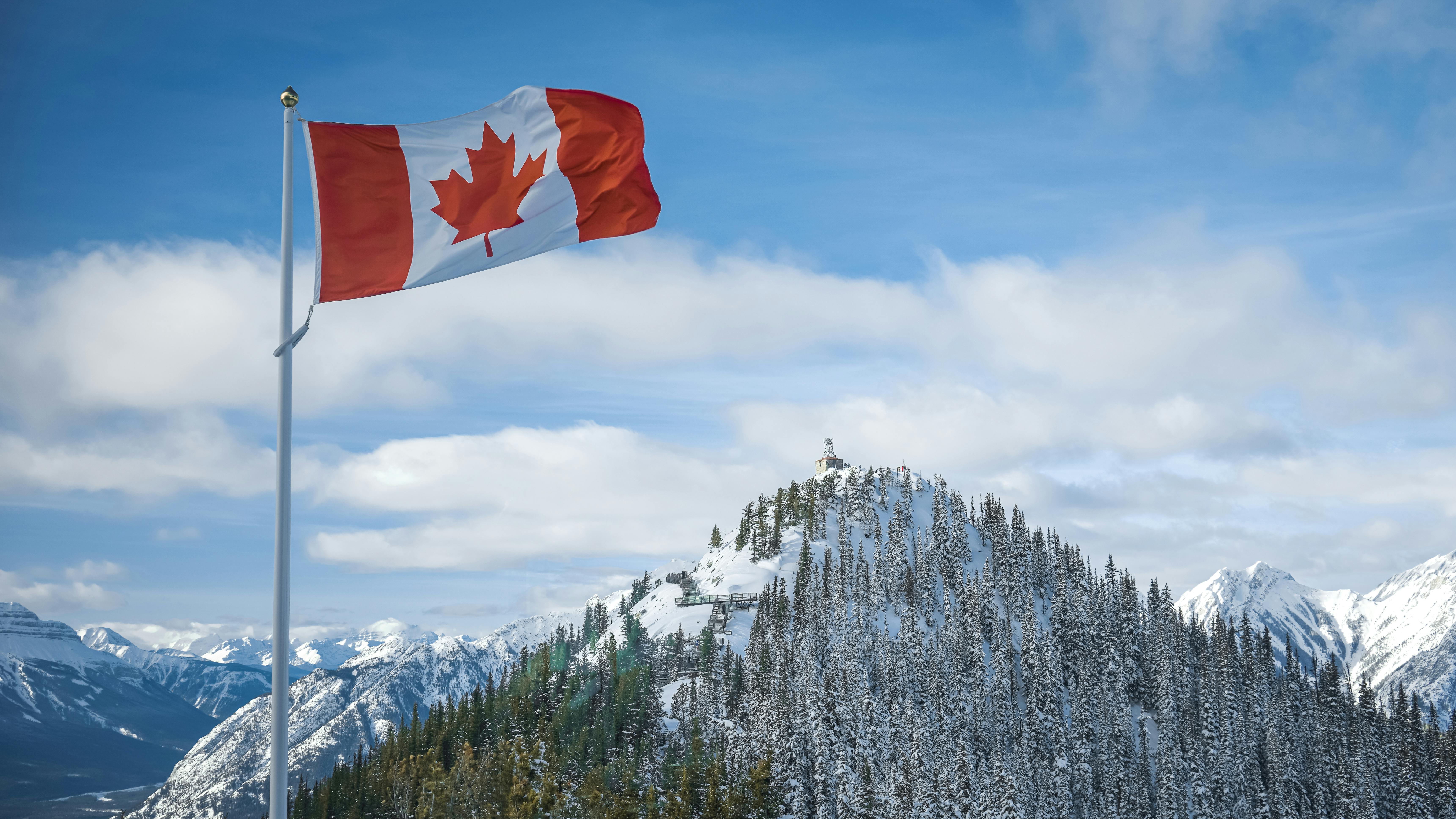 6885x3872 Flag of Canada and Mountains · Free