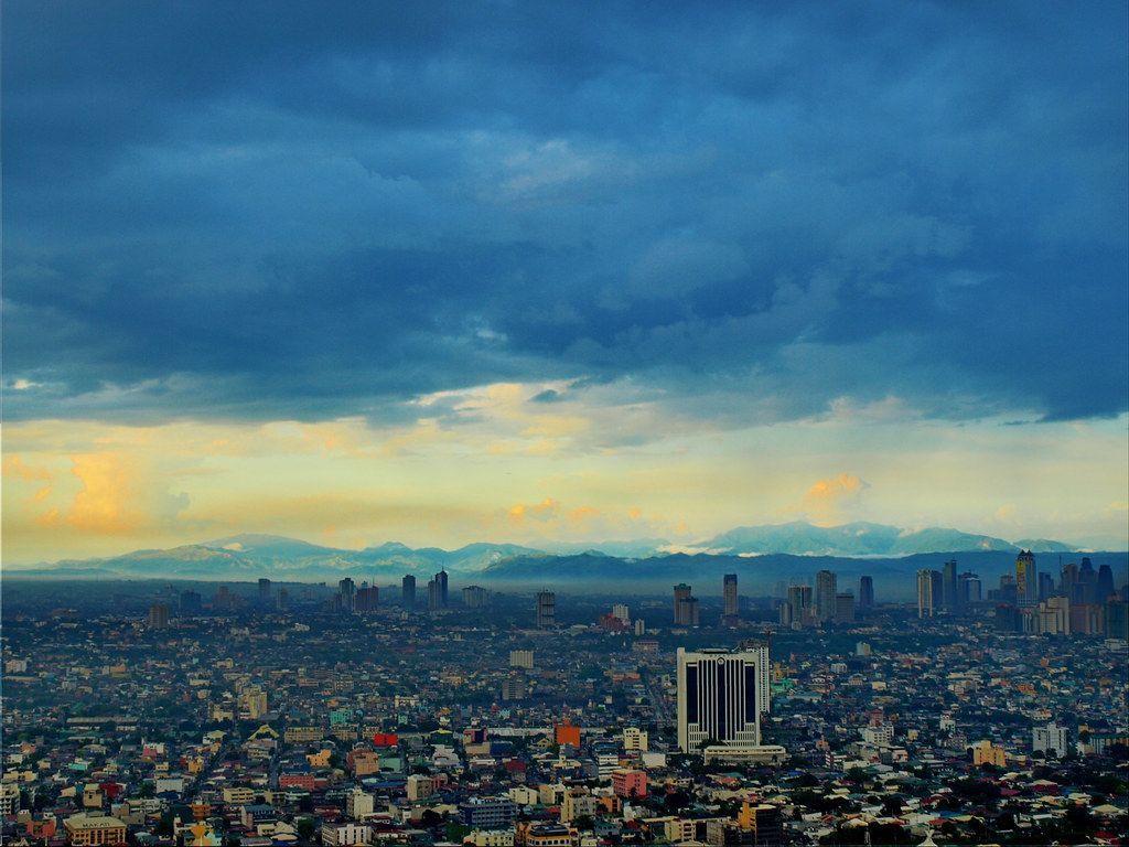 1024x768 Mountains behind Makati City