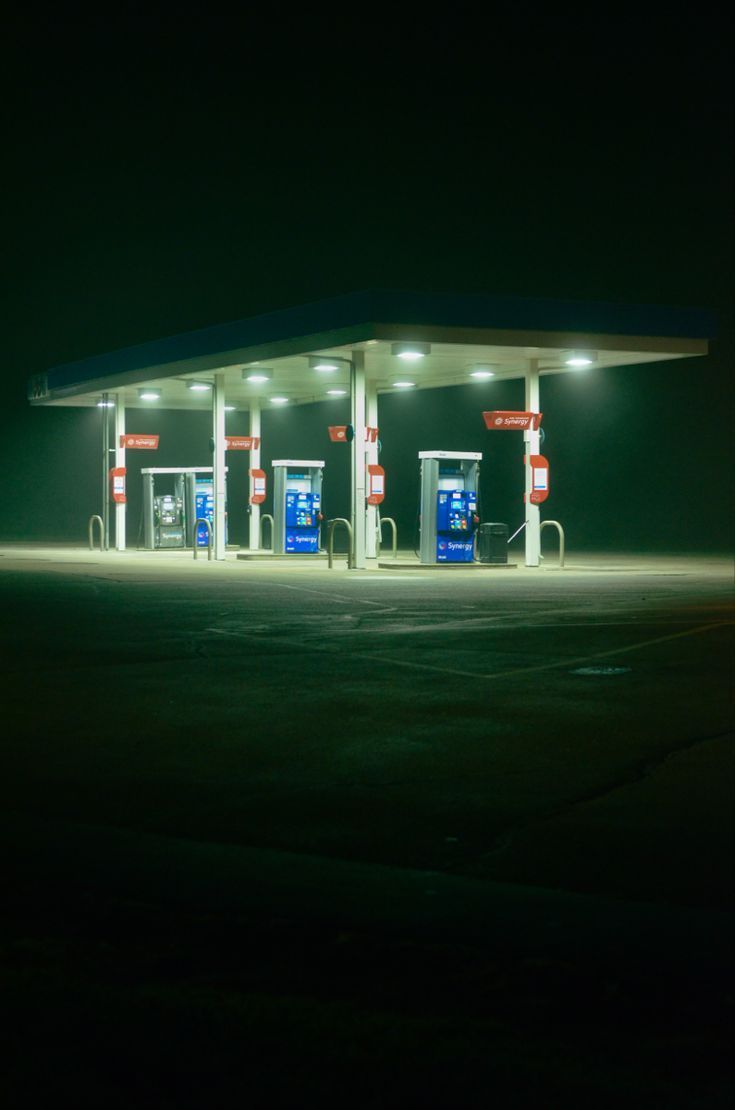 735x1110 gas station night