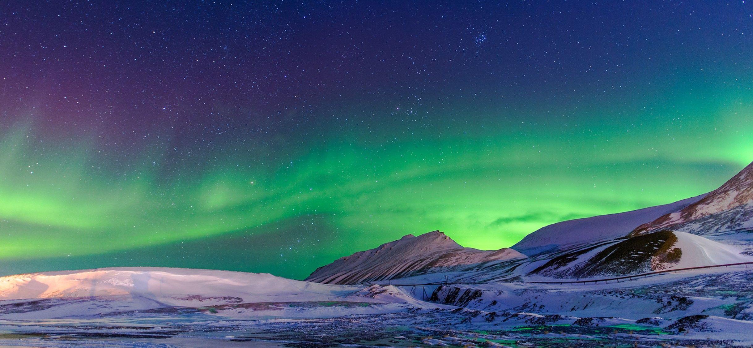 2436x1125 Aurora Borealis and Snowy Mountains iPhone X Wallpaper