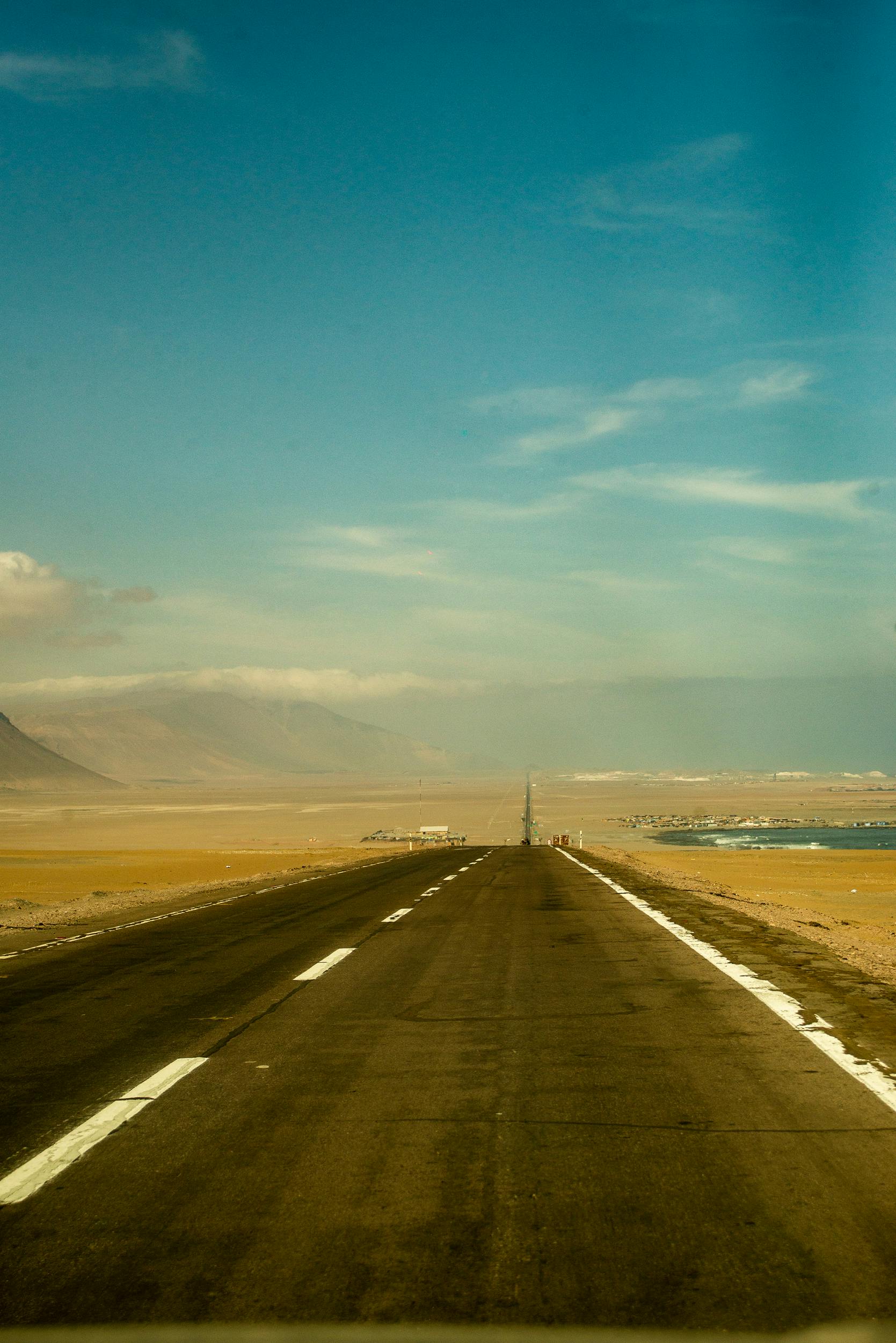 1669x2500 Asphalt Road through Desert · Free