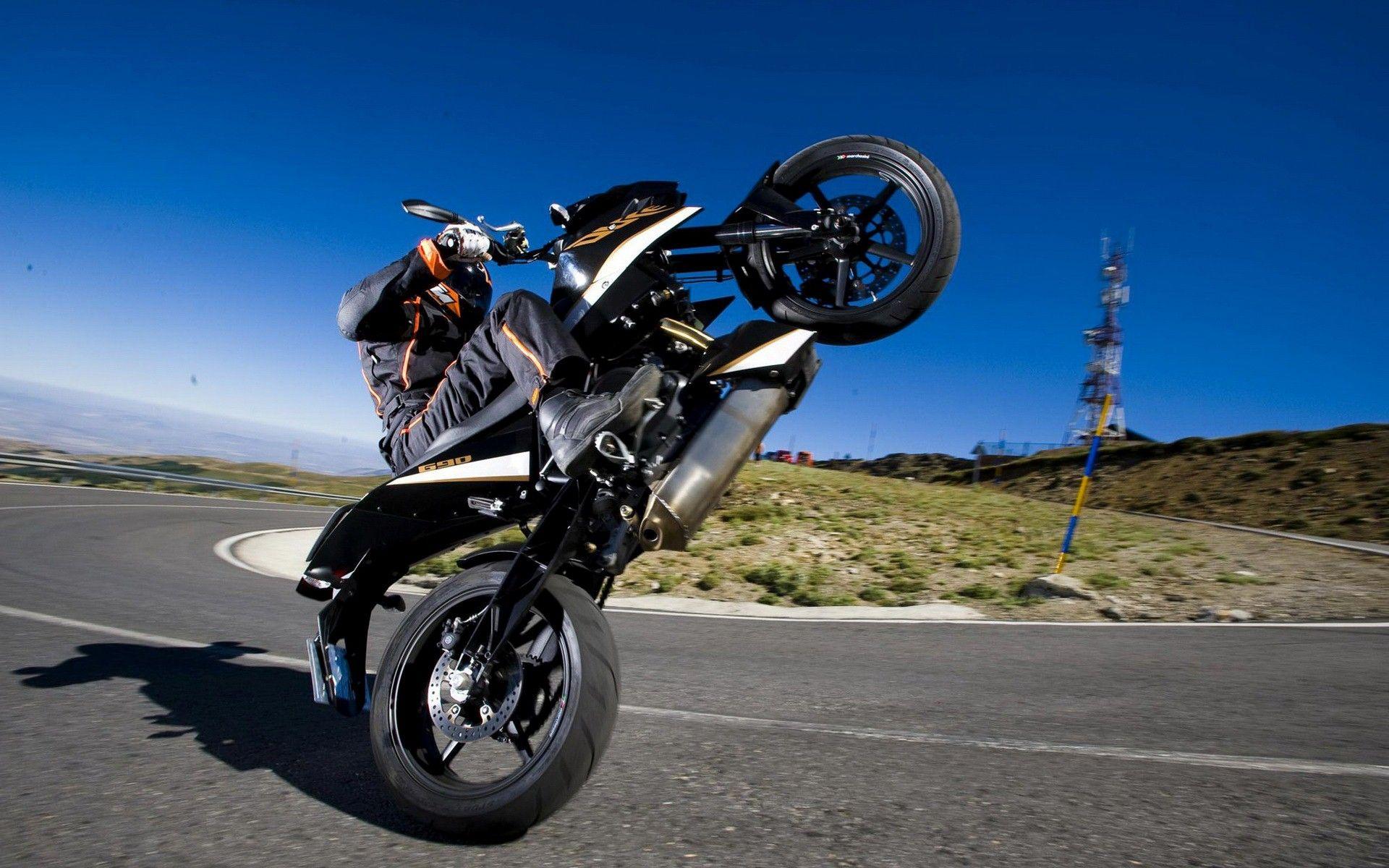 1920x1200 KTM Duke Bike Stunt on Road