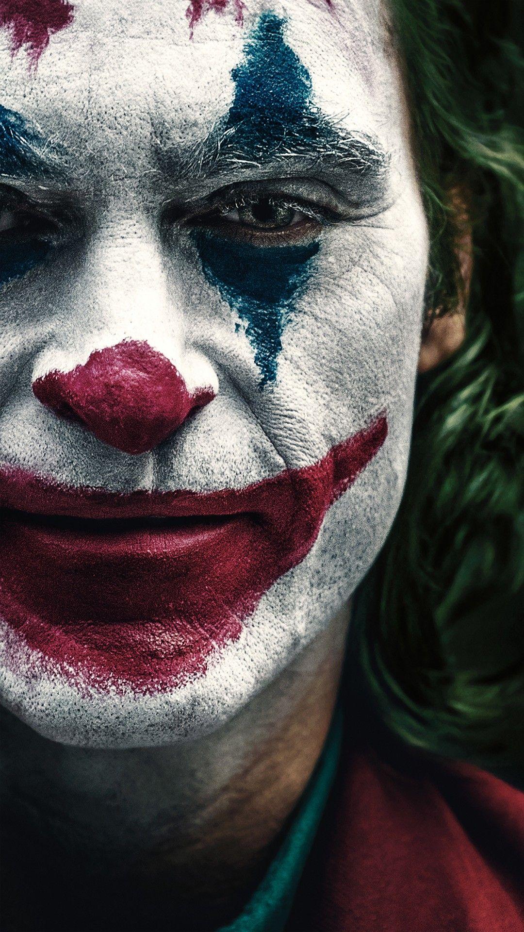 1080x1920 Joaquin Phoenix as Joker 2019 4K 8K Wallpaper. HD