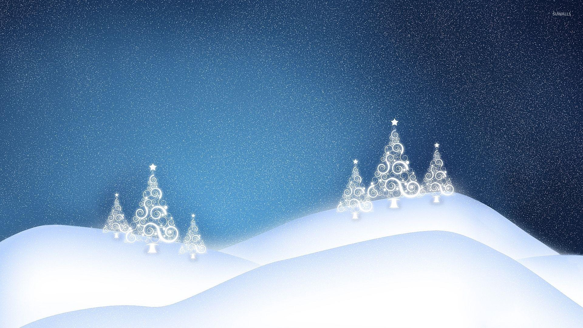 1920x1080 White glowing Christmas tree on the snowy hills wallpaper