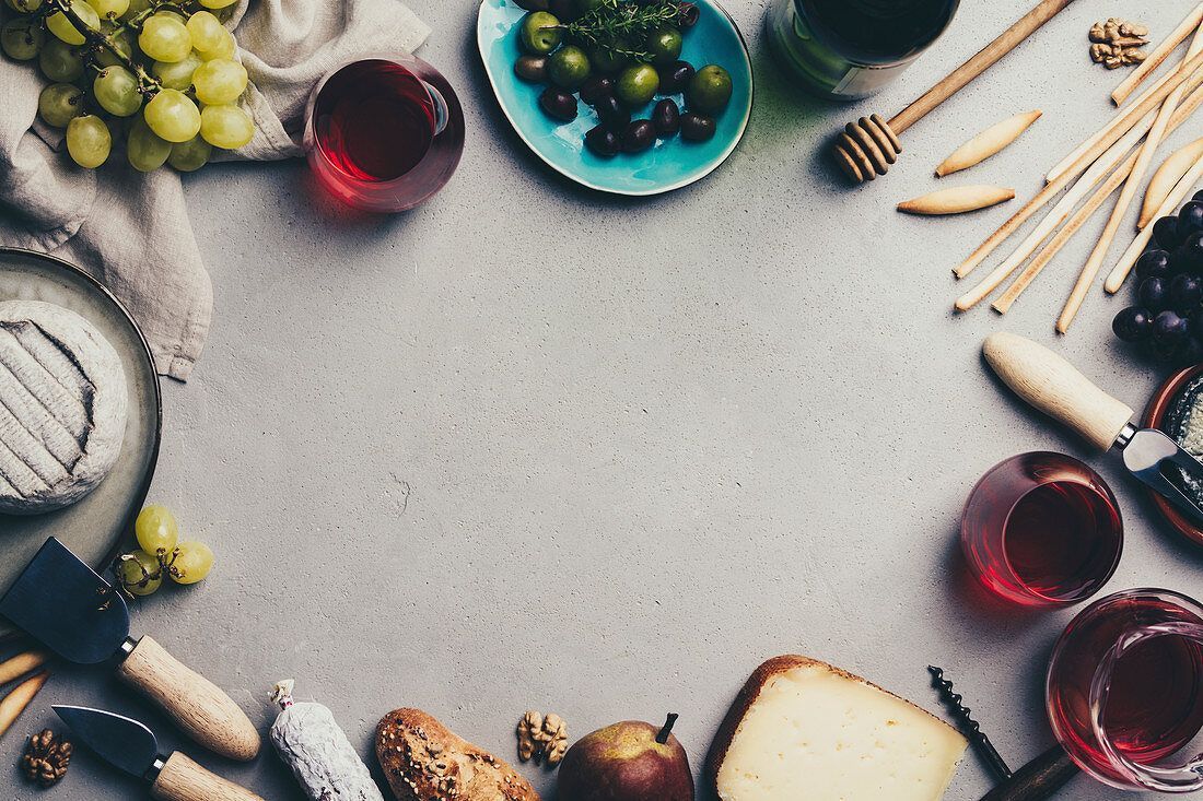 1100x733 Red wine with charcuterie assortment