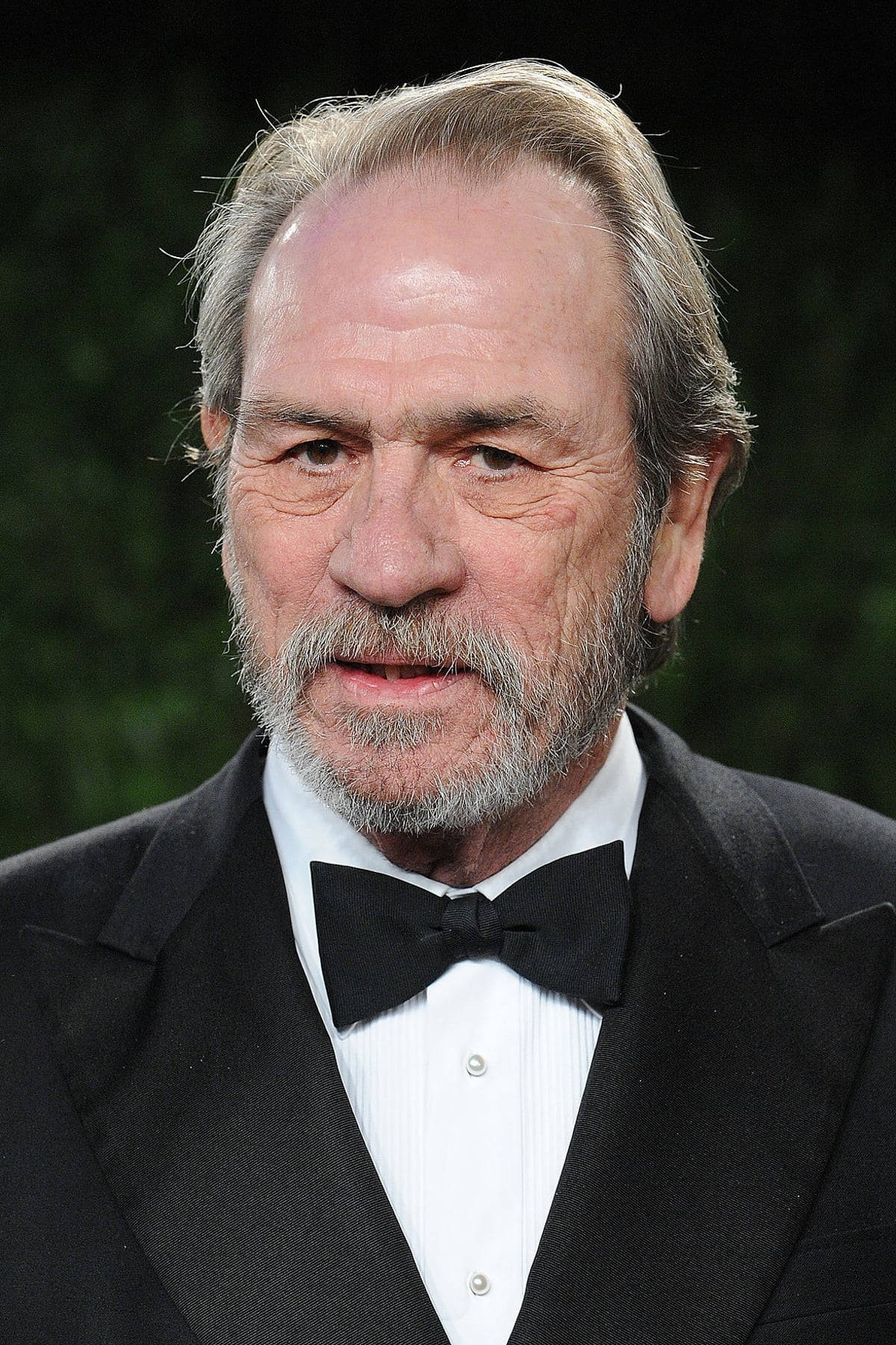 1200x1800 Download Esteemed Actor Tommy Lee Jones Sporting a Thick White Mustache Wallpaper