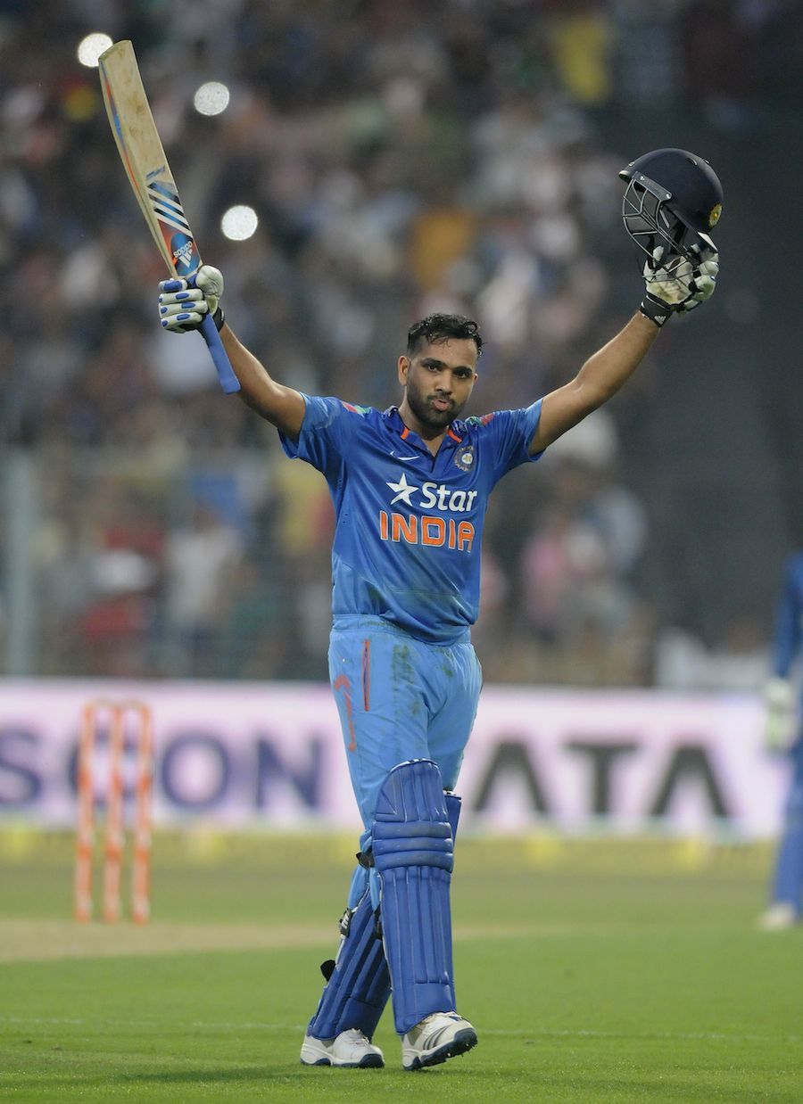 900x1238 Rohit Sharma acknowledges the crowd
