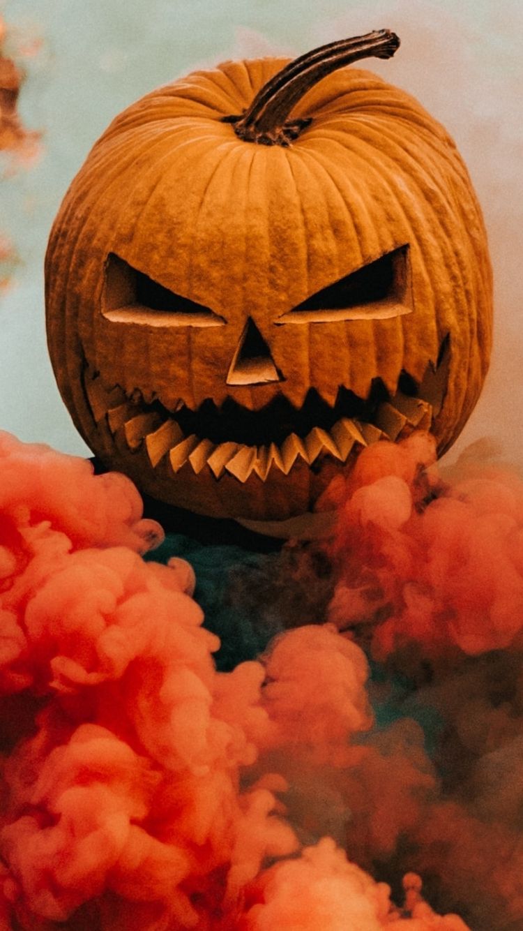 750x1334 Pumpkin Head Halloween Wallpaper