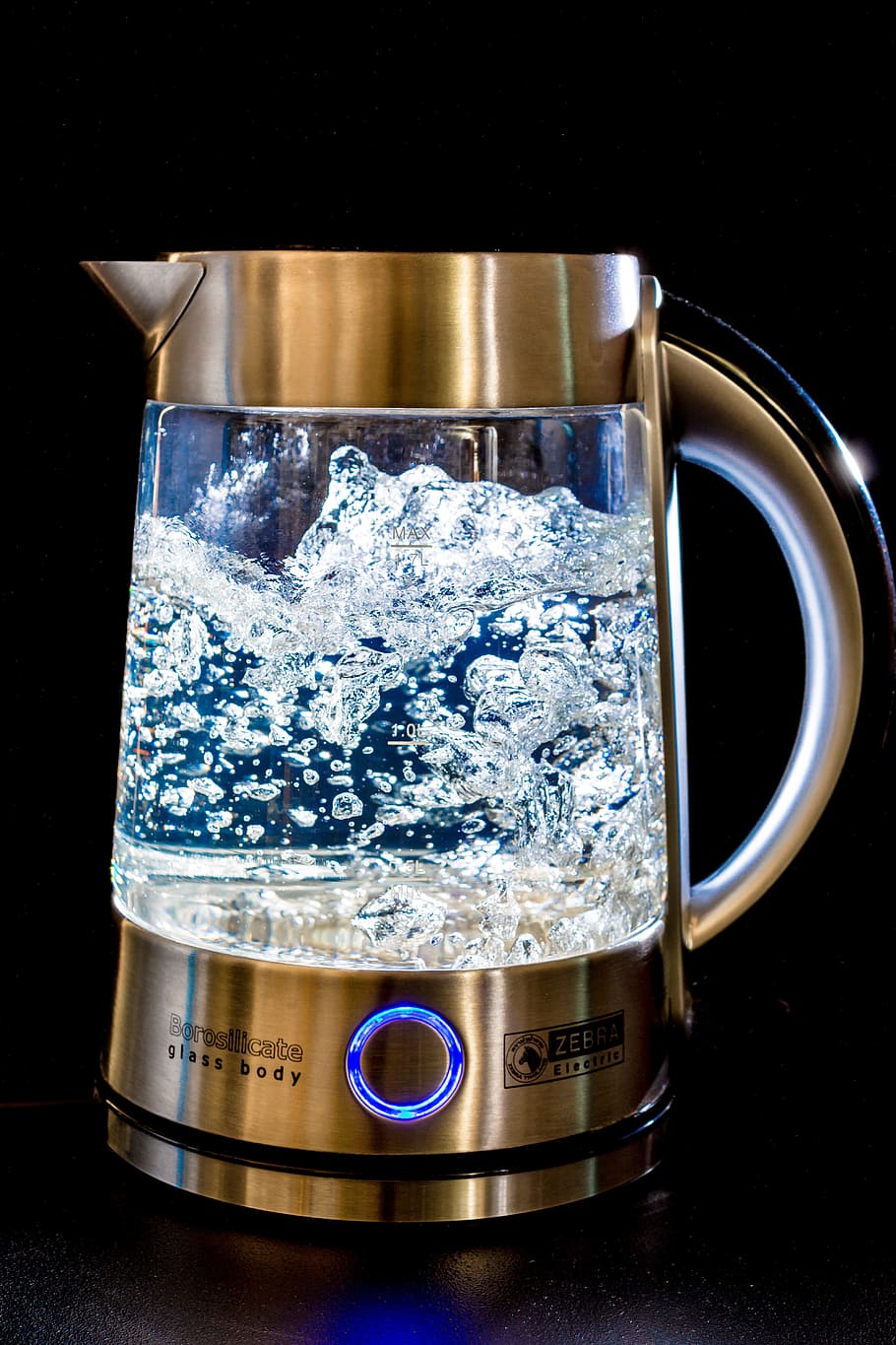 910x1365 boiled water inside pitcher, kettle