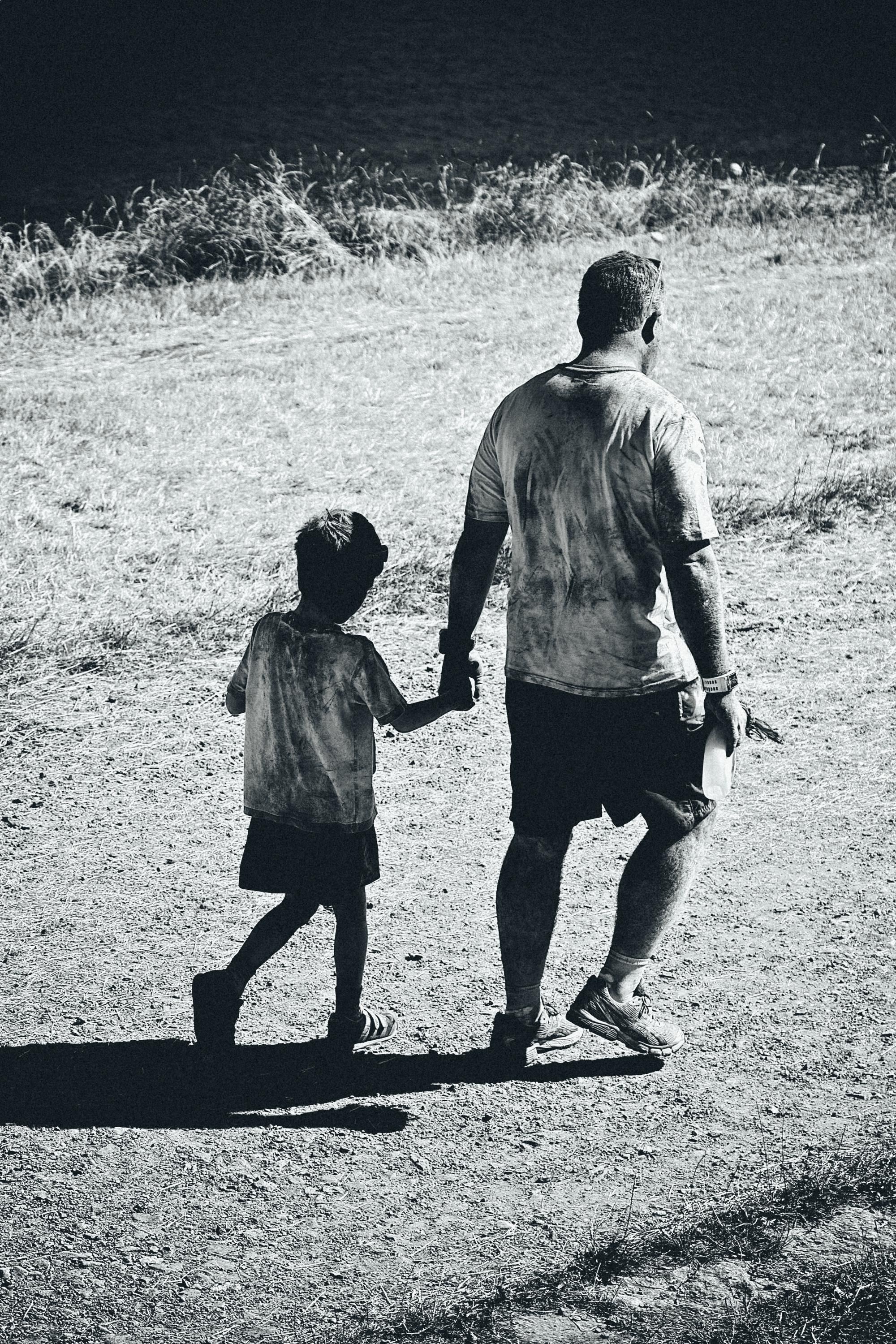2000x3000 Son Holding Hands Royalty Free