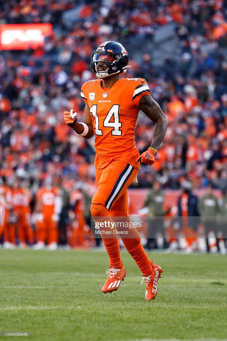 736x1103 Denver Broncos runs during an NFL game