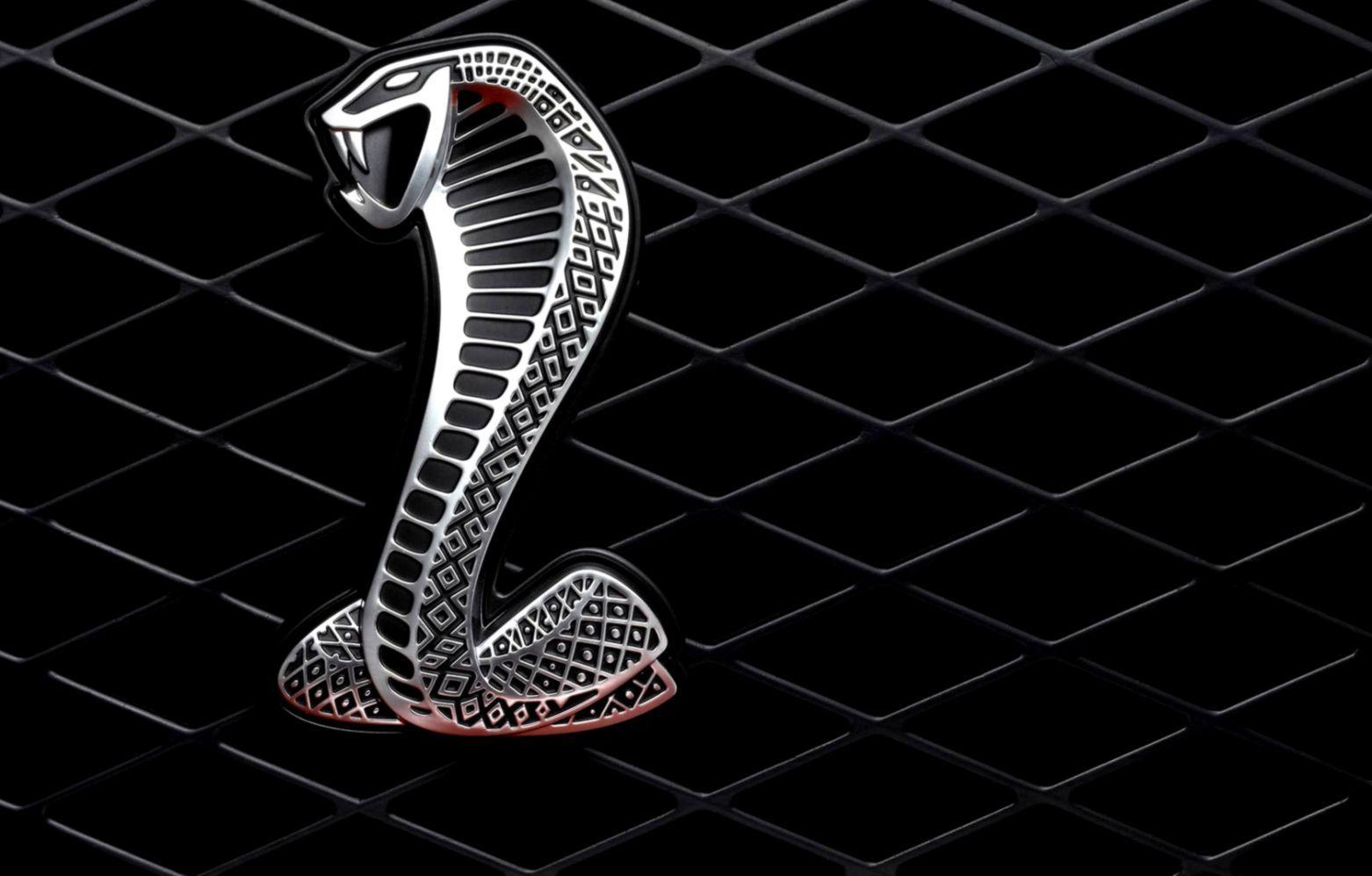 1562x997 Ford Mustang Cobra Logo Wallpaper