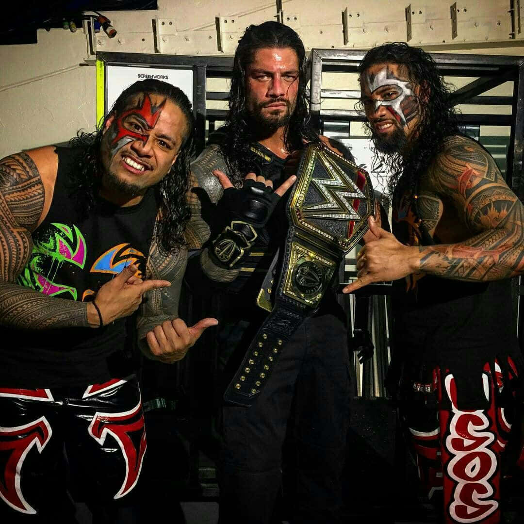 1080x1080 Download Wwe Roman Reigns With Jimmy