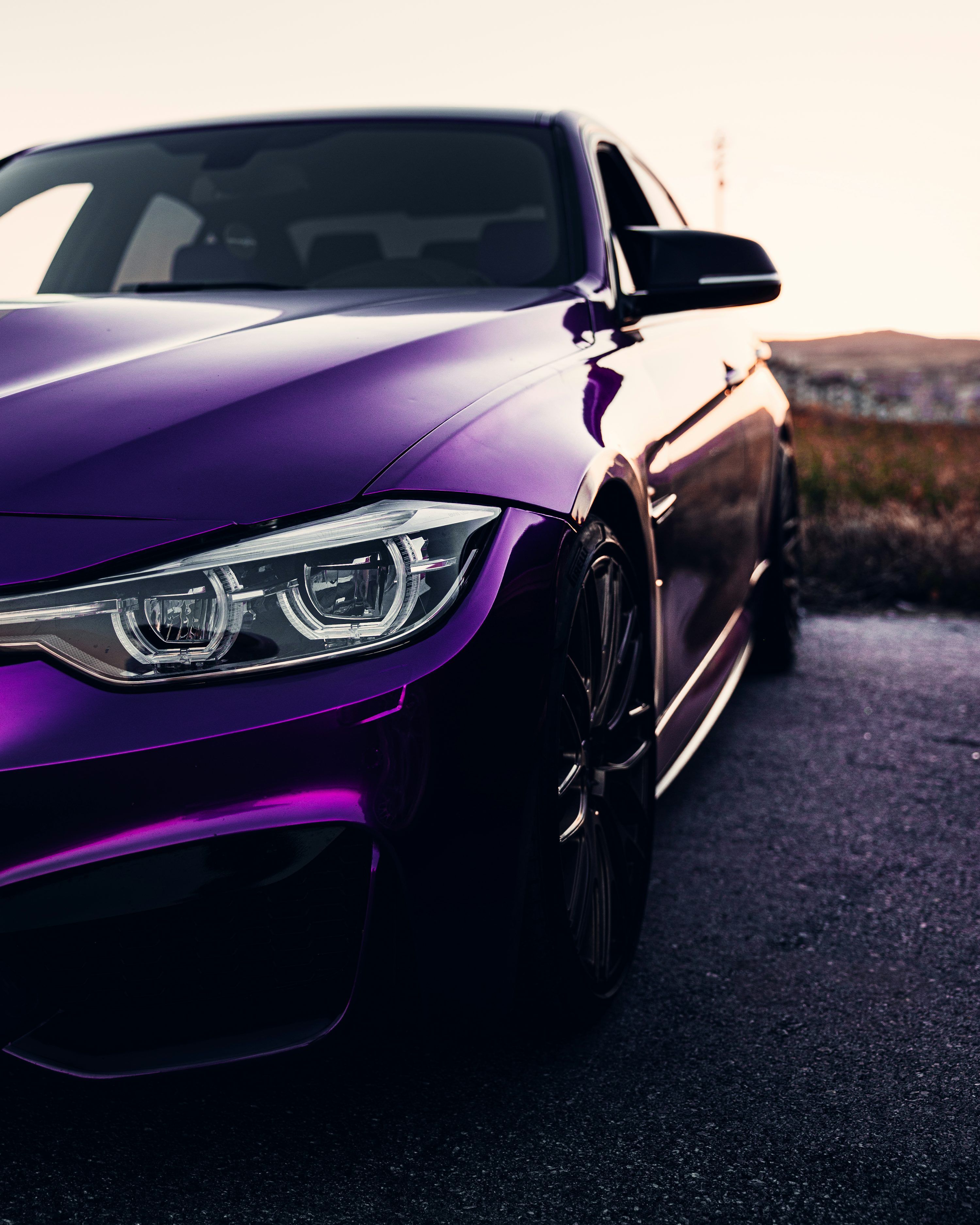 3000x3750 A purple car parked on a road photo