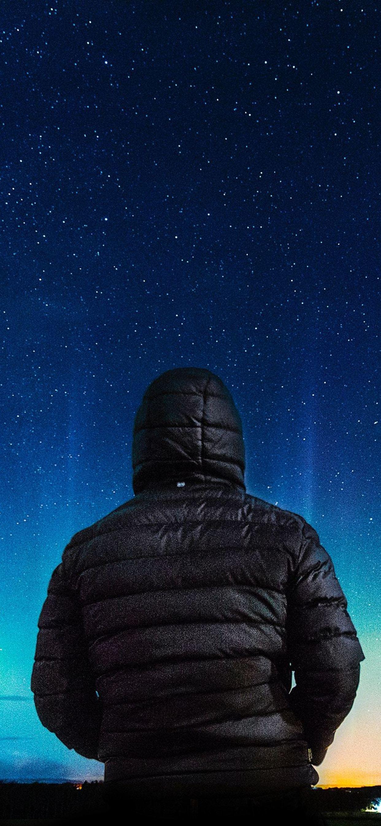1242x2688 Alone Boy In Hoodie Looking Towards Colorful Sky