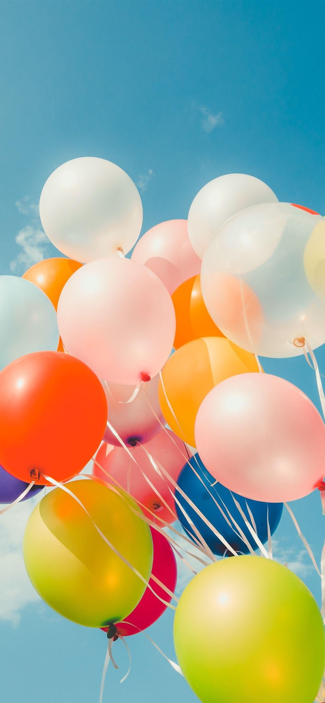 1242x2688 Colorful balloons, blue sky, white clouds 1242x2688 iPhone