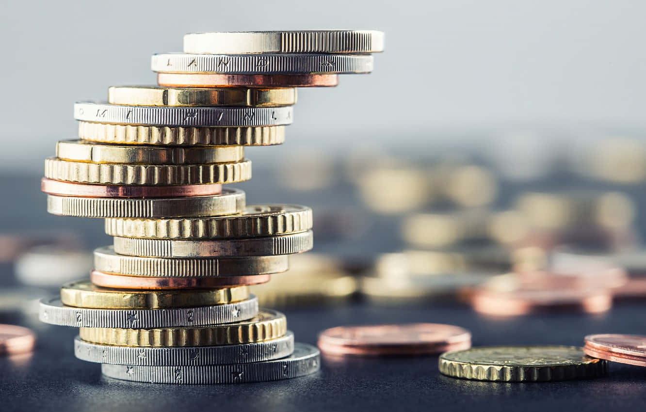 1332x850 Stacked Silver Gold Coins Wallpaper